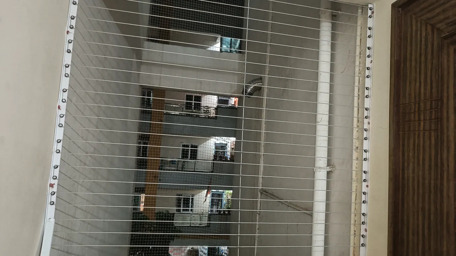 Invisible Grills in Gachibowli high-rise apartment balcony